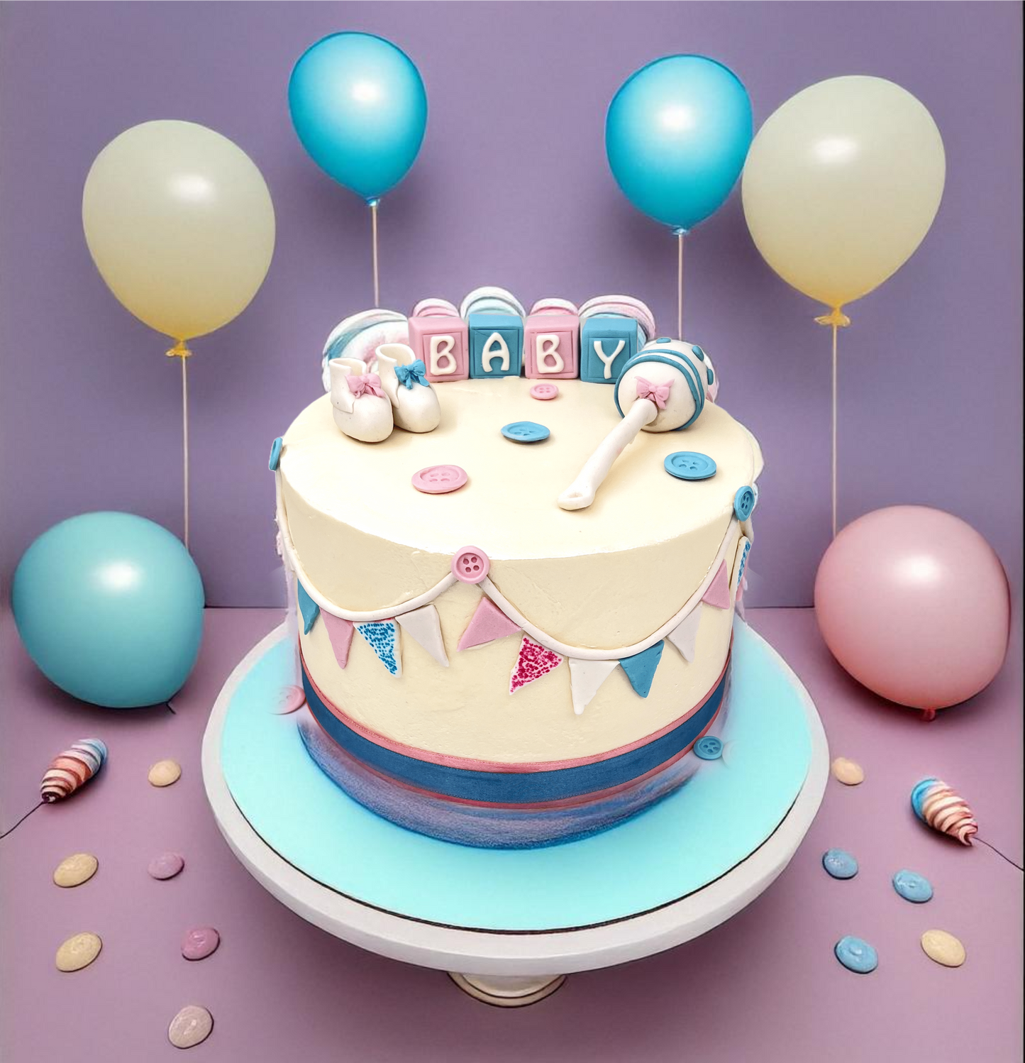 Baby Shower cake with rattle and booties